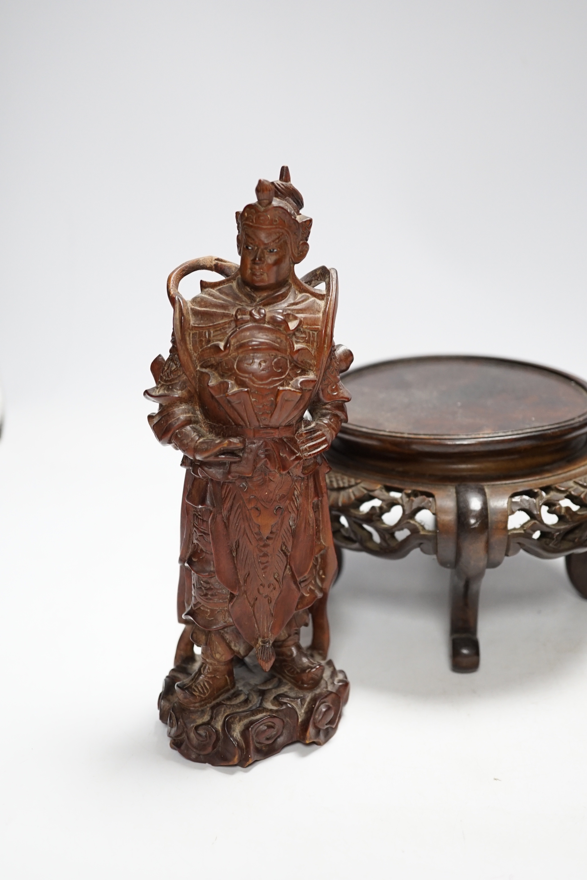 Chinese wood figure of a warrior, two wood stands and a bronze zun vessel